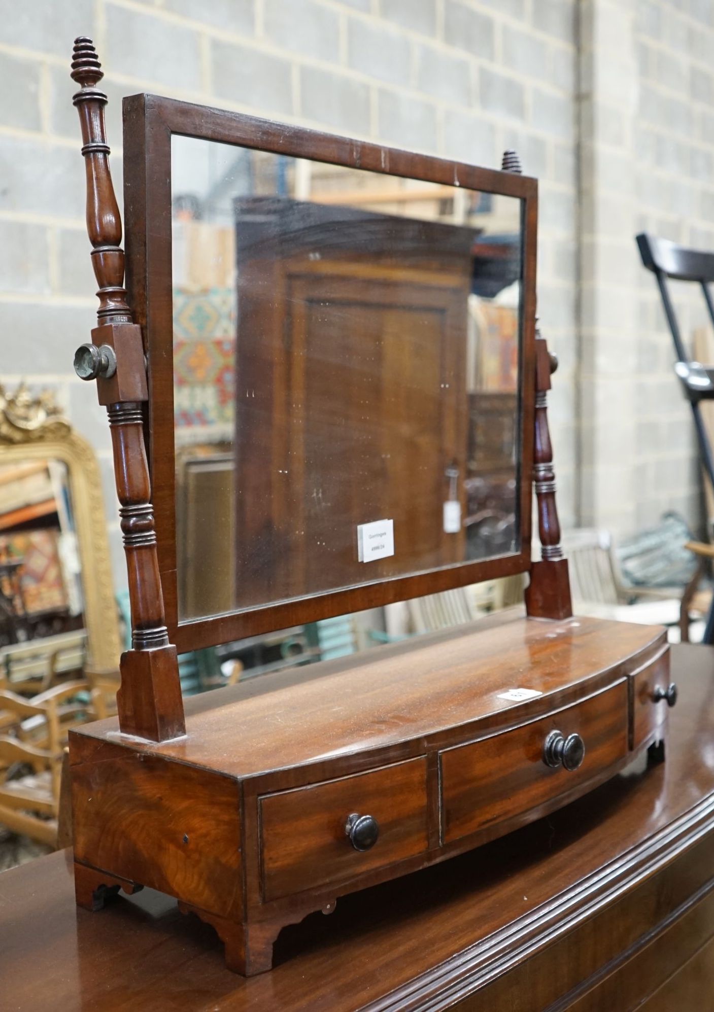 A Regency mahogany toilet mirror, width 59cm, height 63cm